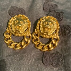 Vintage lion earrings, I got these at an estate sale. No info on material.